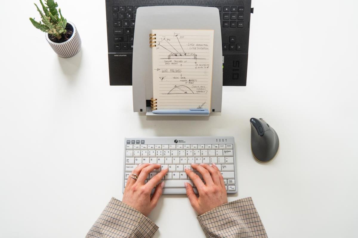BakkerElkhuizen Q-330C 'Circular' Laptop Stand with integrated document slope is manufactured using 96% recycled materials and is fully recyclable - ECO. Height adjustable its lightweight design; just 485g folds flat to 228mm x 310mm x 13mm. Includes 5 ye thumbnail