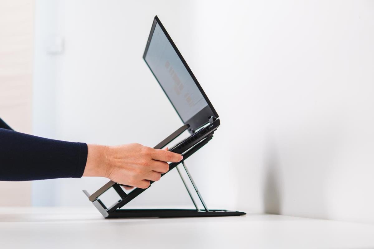 BakkerElkhuizen Q-330C 'Circular' Laptop Stand with integrated document slope is manufactured using 96% recycled materials and is fully recyclable - ECO. Height adjustable its lightweight design; just 485g folds flat to 228mm x 310mm x 13mm. Includes 5 ye thumbnail